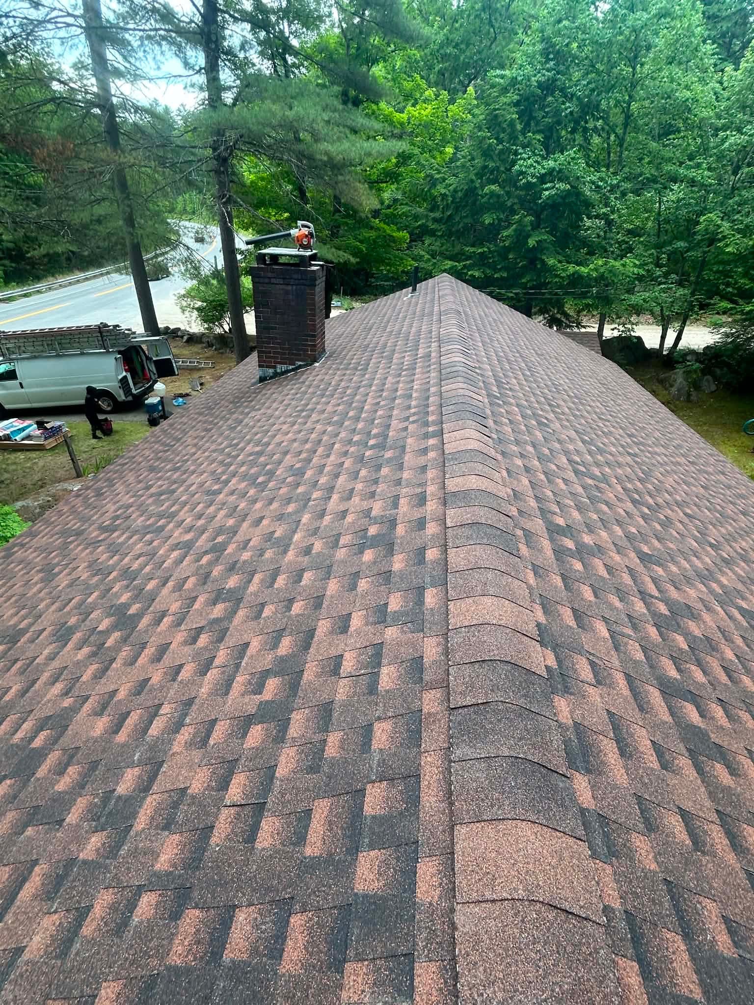 Shingle roofing around a chimney
